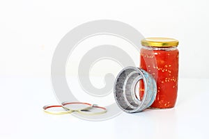 Home preserved tomatoes in jars