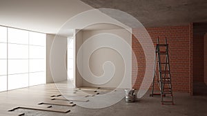 Home renovation, restructuring process, repair and wall painting, construction concept. Brick and painted walls, parquet floor,