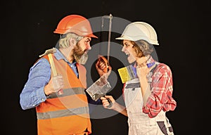 home renovation service. real estate deal. couple of architect wear hardhat. new house construction concept. Portrait of