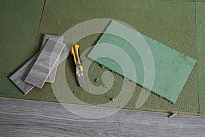 Home repair. Installation of laminate and underlayment