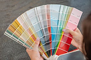 Home repairs. Choice of wall paint colors. The designer selects a color from the RAL palette for painting the room. RAL