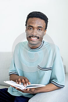 home rest happy man book lover smiling casual