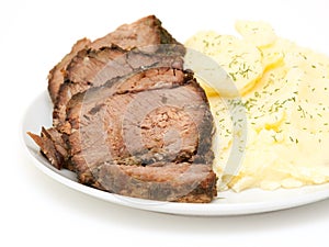 Home roast beef slices with mashed potatoes