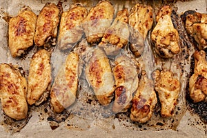 Home roasted chicken wings on a baking tray