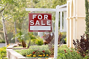 Home For Sale Real Estate Sign in Front of New House