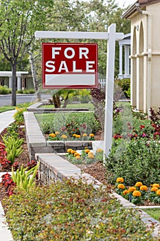 Home For Sale Real Estate Sign in Front of New House