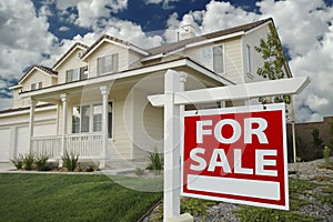 Home For Sale Sign and House