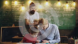 Home schooler. Parents with kids ready for school.