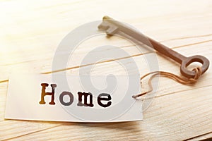 home security concept - old key with tag