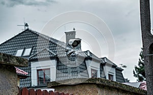 Home security system. House under CCTV camera surveillance