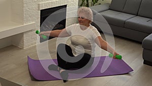 Home Sport. Active Senior Woman Doing Warming Stretching Exercises In Front Of Laptop, Training With Online Tutorials