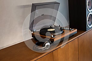 Home Stereo Turntable System Placed on Retro Self with Space for Text