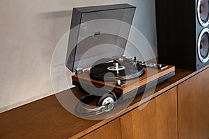Home Stereo Turntable System Placed on Retro Self with Space for Text