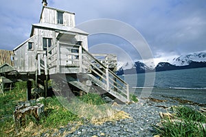 Home on stilts on water, Seward, Alaska photo