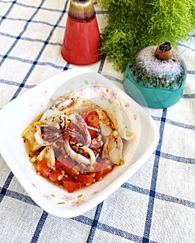 Home style squid dish with garlic and tomato