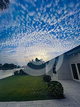 sunset and pretty clouds in the back yard