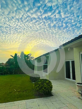 sunset and pretty clouds in the back yard