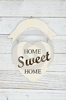 Home Sweet Home message on a wood heart sign