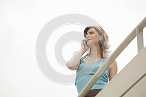 Home Tech Woman on Balcony