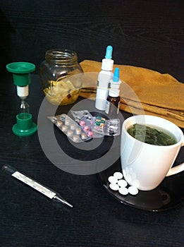 Home treatment for colds. Tablets, tea photo