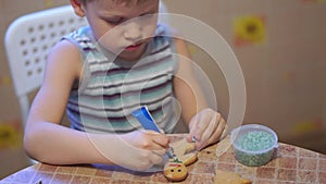 Home video - happy kids making cookies at home in the kitchen