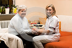 Home visit doctor with senior