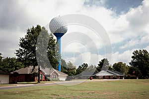 Home And Water Tank On Golf Course