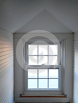 Home: white attic window