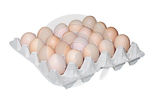 Homegrown organic chicken eggs on package of recyc