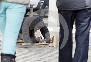 Homeless begger begging