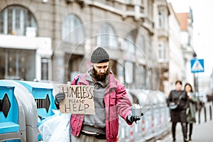 Homeless begging money on the street