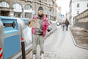 Homeless begging money on the street