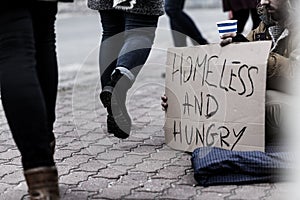 Homeless and hungry pauper