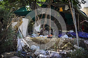 Homeless makeshift shelter or hut in a forest made with recovered material, Alicante, Spain