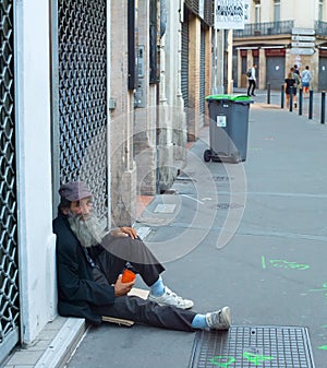 Homeless man beggar street France