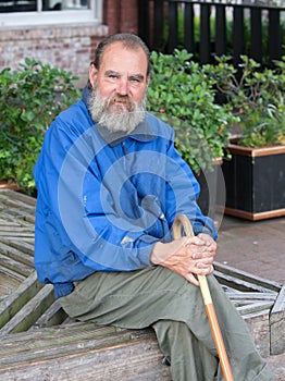 Homeless man with cane