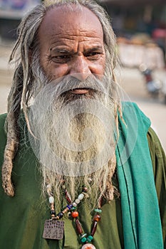 Homeless man in long beard