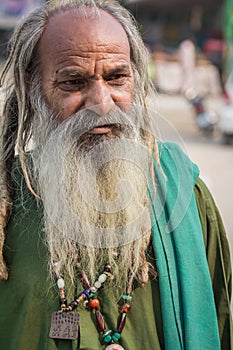 Homeless man in long beard