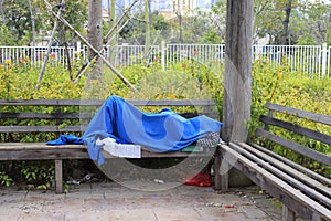 Homeless man sleeping in the park