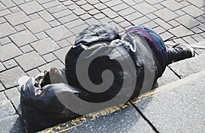 Homeless man sleeping on the street