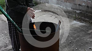 Homeless Man Warms His Hands At Trash Can Fire Rages In Steel Barrel Dumpster Can