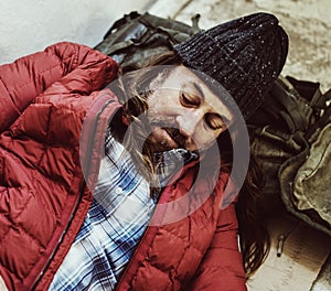 Homeless Men sleeping on road side