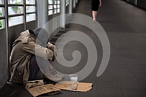 Homeless old man beg for money in city