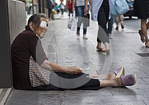 Homeless old woman beggar