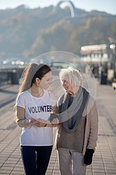 Homeless pensioner feeling good spending time with volunteer