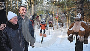 Homeless people are interviewed in the winter in the woods.