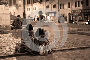 Homeless people sleeping on the street in Rome, Italy