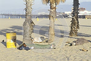 Homeless people sleeping at Venice Beach, California