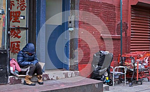 Homeless Person on NYC Streets Alone with Belongings in Manhattan New York City