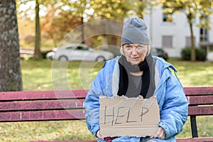 Homeless or poverty stricken elderly lady